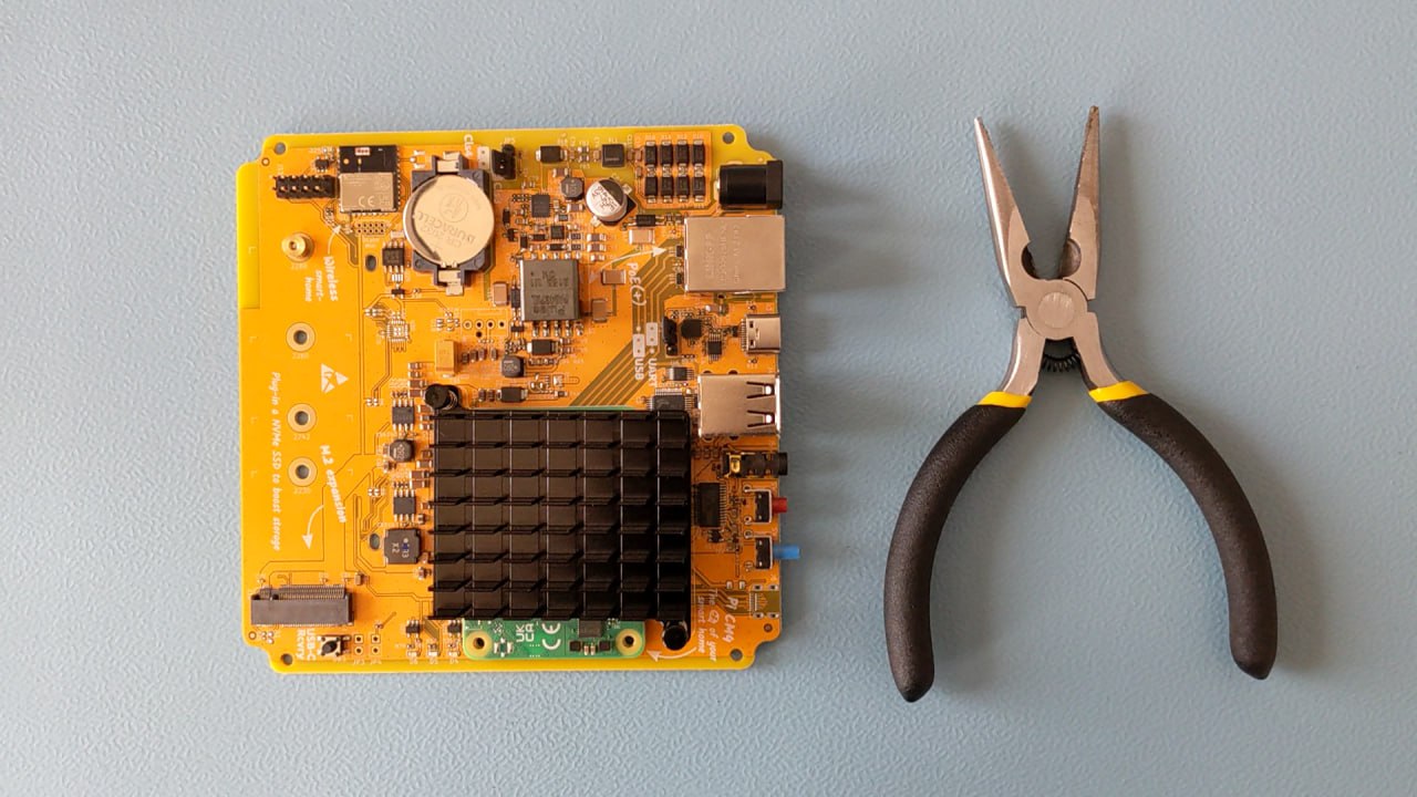 Home Assistant Yellow and flat nose pliers